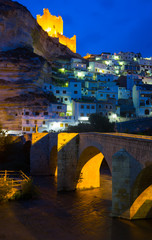 night view of Alcala del Jucar with  bridge
