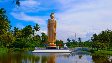 Giant Buddha Statue Hikkaduwa Sri Lanka - 128366819