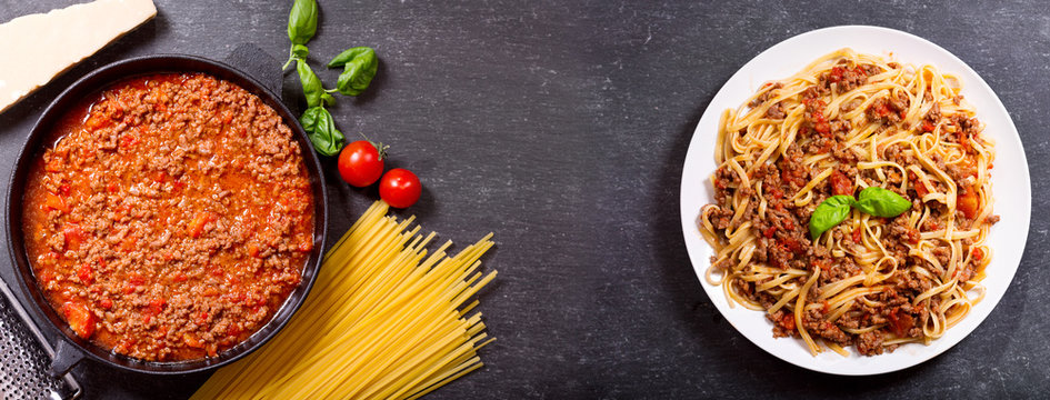 pasta bolognese and ingredients for cooking
