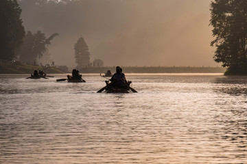 Canoe silhouette in the lake