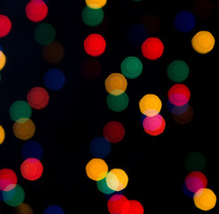 Colored flashlight on the dark background.