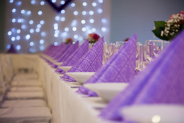 purple napkins on wedding table