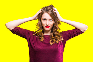 Fototapeta premium Woman on a yellow background