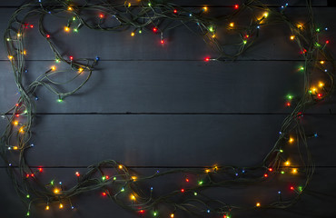 Glowing Christmas tree garland in the form of a frame