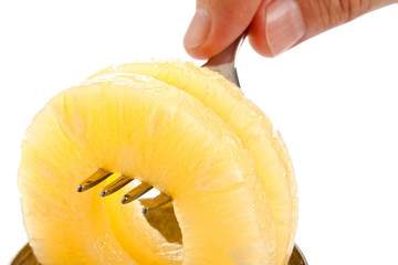slice of pineapple on a fork