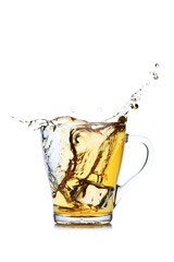 Glass of tea with ice cube isolated on a white