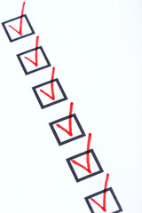Check boxes on white paper