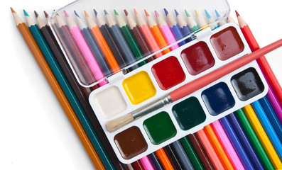 Naklejka premium watercolor paints and brushes