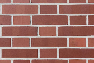 Background masonry of red brick.