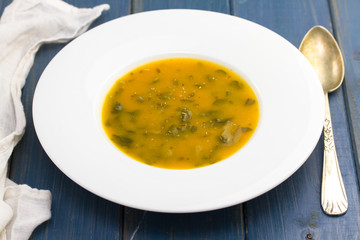 vegetable cream soup on white plate