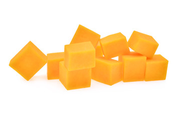 fresh butternut squash cubes isolated on white background