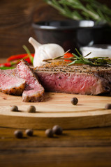 rare steak wooden cutting board
