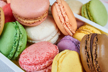 Colorful french macaroons in a box