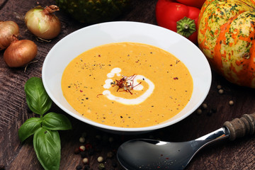 Pumpkin soup on a wooden table