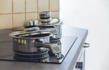 Stainless steel cooking pot on a stove