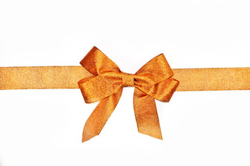 Fototapeta premium Golden sparkling holiday bow with ribbon