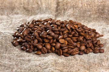 coffee beans on burlap background