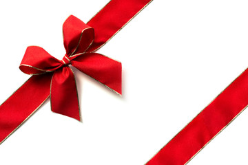 Red ribbon and bow isolated on white