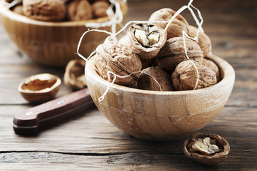 Healthy walnuts on the wooden table