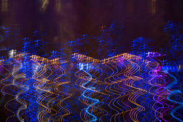 Abstract background made of Christmas lights with long exposure. 