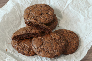 Fudge brownie cookies heap on parchment
