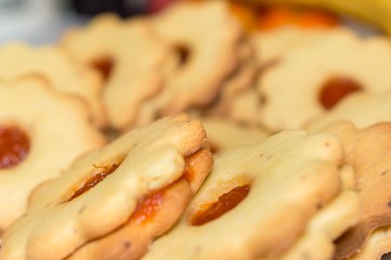 Homemade apricot jam Linzer with fruits close up