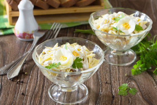 Festive Salad With Pickled Herring, Cheese And Egg. Appetizer On