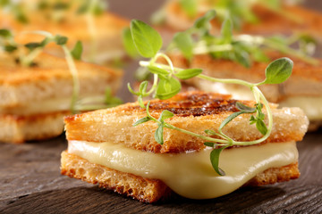 Fresh toast with cheese and herbs