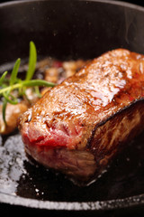 Beef steak on cast iron skillet