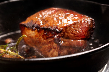 Beef steak on cast iron skillet