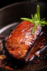 Beef steak on cast iron skillet