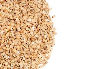 Uncooked oat flakes on white background. Close up, top view, high resolution product. Healthy food Concept.