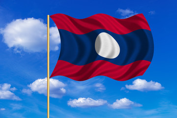 Flag of Laos waving on blue sky background