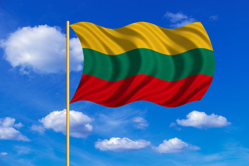 Flag of Lithuania waving on blue sky background