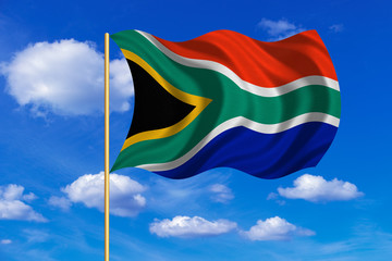 Flag of South Africa waving on blue sky background