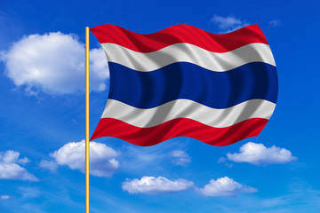 Flag of Thailand waving on blue sky background