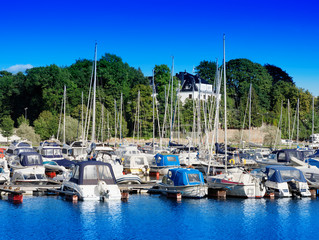 Fototapeta na wymiar Ships and boats at Norway port background