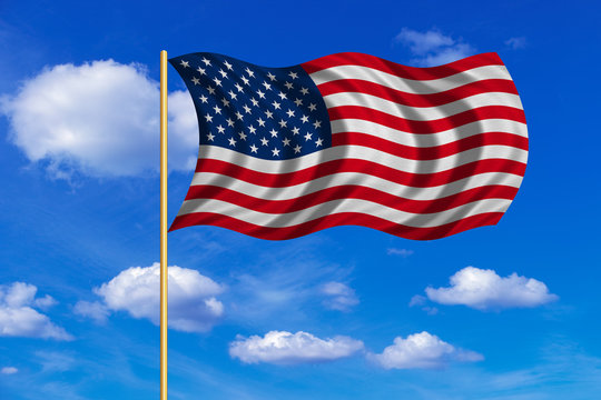 Flag of USA waving on blue sky background