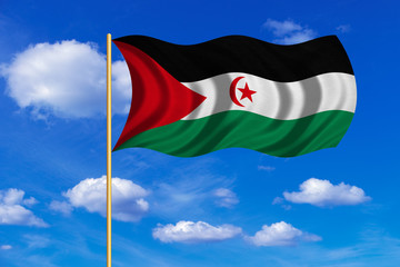 Flag of Western Sahara wavy on blue sky background
