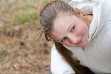 Little girl resting in forest
