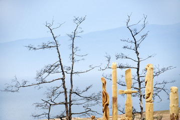 Wooden shamanic totems at Burhan Cape, Baikal Lake, Russian Federation