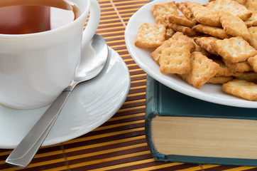 Fragment of a saucer with a cup of tea