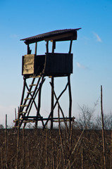 Hunting watchtower on a meadow at sunny autumn day, Deliblatska pescara, Serbia