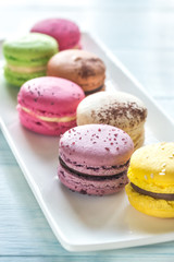 Fototapeta premium Colorful macarons on the white plate