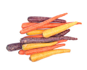 Colorful organic carrots isolated on white background