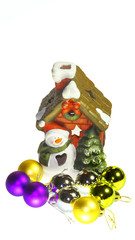 New Year's toys and Christmas-tree decorations on a white background