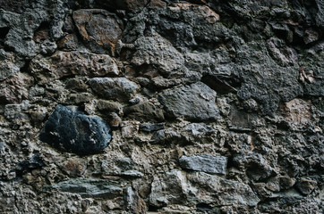 Dark dirty grungy rusty medieval wall closeup texture