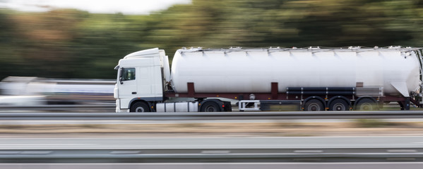 gasoline transportation truck on highway speed blur