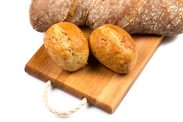 Various of bread on cutting board