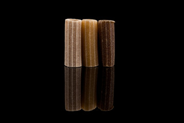 Close-up of pasta over black background